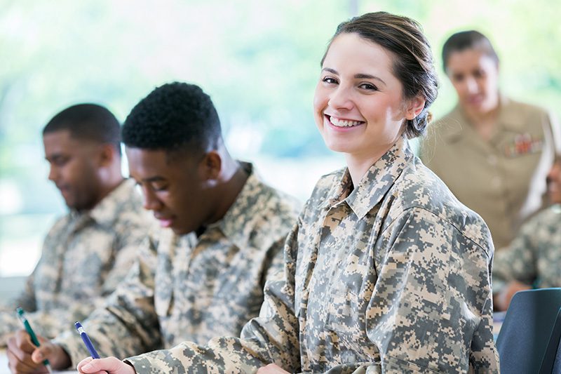 Military members taking a strategy course online