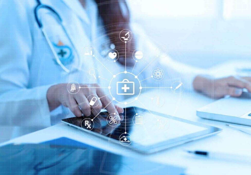 Medicine doctor or medical students with stethoscope using digital tablet laptop,Health Check with digital system support for patient with medical icon at hospital, Medical network technology concept.